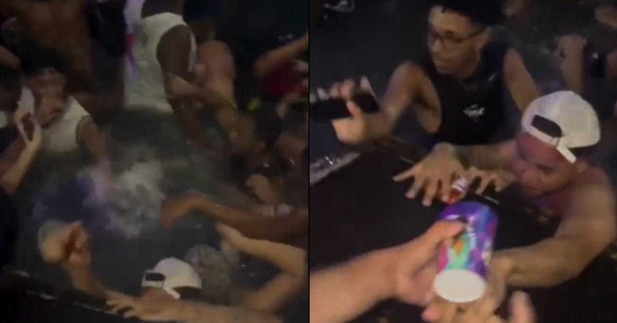 [VÍDEO] Piso improvisado em boate desaba e festeiros caem na água durante festa no RJ